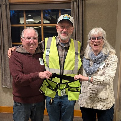 2024 Outstanding Volunteers: Dick Malone, Rick Dingus, and Kathy Malone. Photo: Land Trust.